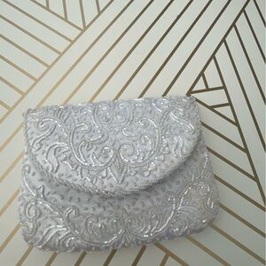 Elegant Silver Beaded Clutch